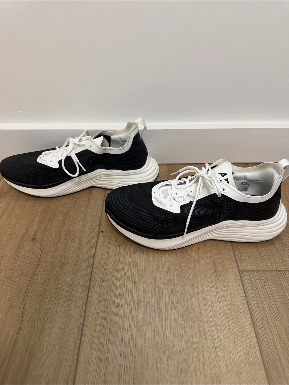 APL Men's Black and White Low-Top Sneakers